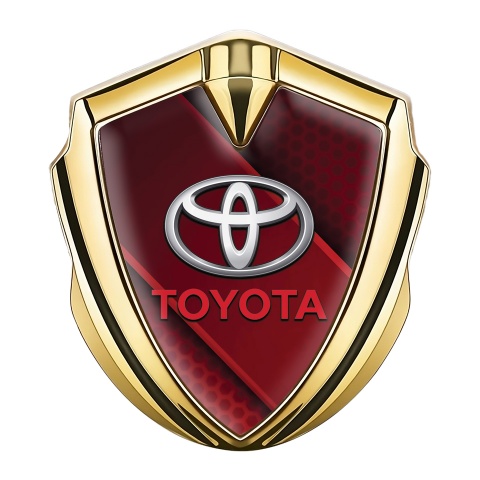Toyota Bodyside Emblem Badge Gold Hex Base Red Ribbon Variant