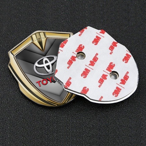 Toyota Trunk Emblem Badge Gold Grey Arrows Red Characters Motif
