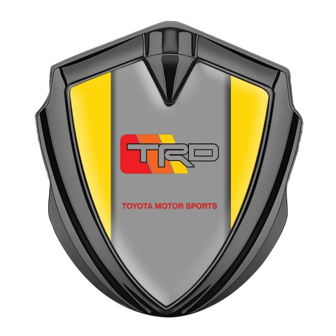 Toyota TRD Emblem Trunk Badge Graphite Yellow Frame Racing Logo