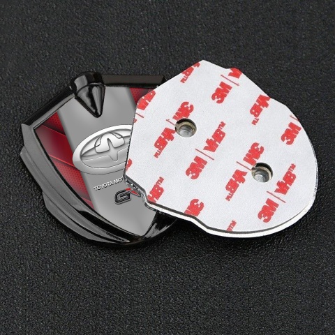 Toyota GR Emblem Badge Self Adhesive Graphite Red Fragments Grey Logo