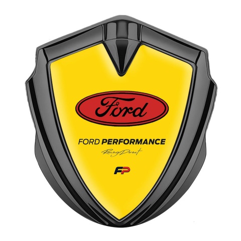 Ford Emblem Car Badge Graphite Yellow Background Performance Design