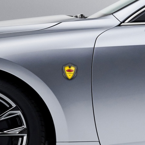 Ford Emblem Car Badge Graphite Yellow Background Performance Design