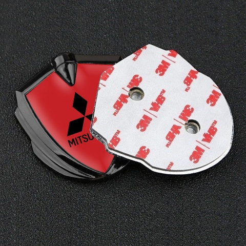 Mitsubishi Fender Emblem Badge Graphite Red Background Black Logo Motif