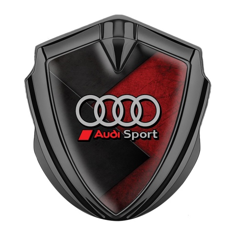 Audi Bodyside Emblem Badge Graphite Red Stone Surface Sport Rings