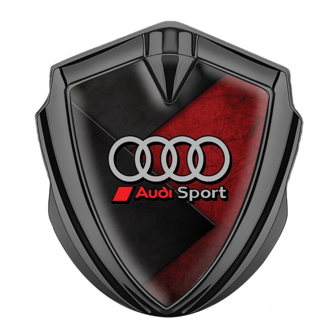Audi Bodyside Emblem Badge Graphite Red Stone Surface Sport Rings