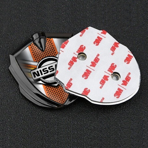 Nissan Metal Domed Emblem Graphite Orange Motif Greyscale Logo