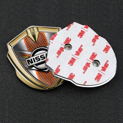 Nissan Metal Domed Emblem Gold Orange Motif Greyscale Logo