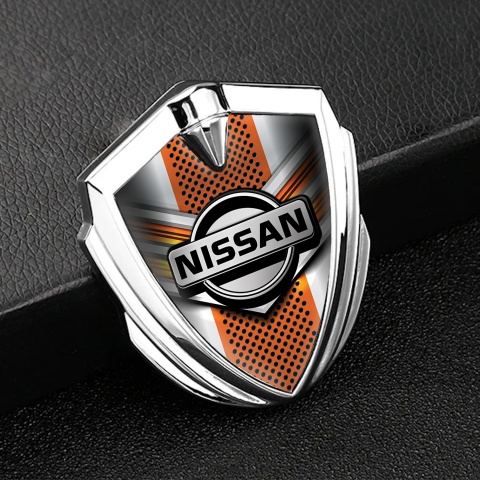 Nissan Metal Domed Emblem Silver Orange Motif Greyscale Logo