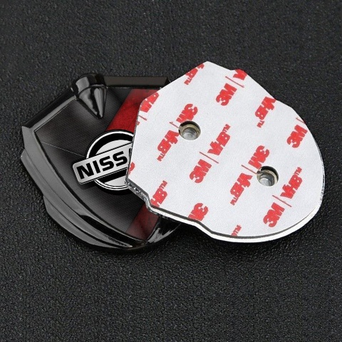 Nissan Emblem Trunk Badge Graphite Dark Red Scratched Surface Design