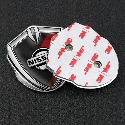 Nissan Emblem Trunk Badge Silver Dark Red Scratched Surface Design