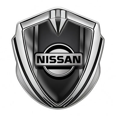 Nissan Emblem Badge Self Adhesive Silver Metallic Frames Black Base