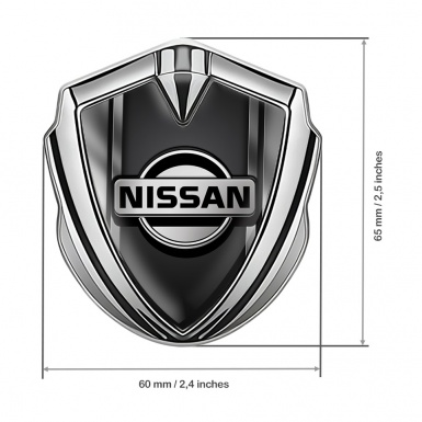 Nissan Emblem Badge Self Adhesive Silver Metallic Frames Black Base