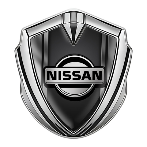 Nissan Emblem Badge Self Adhesive Silver Metallic Frames Black Base