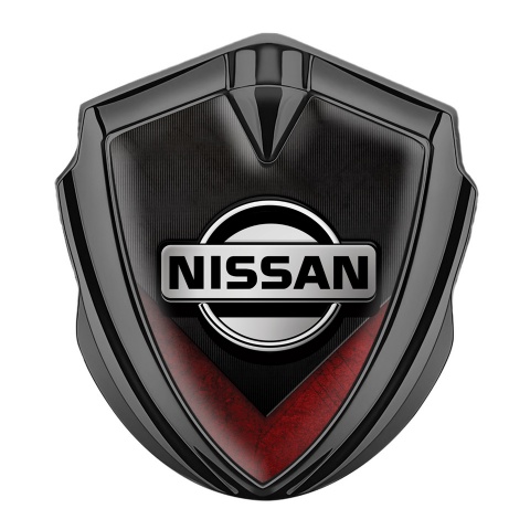 Nissan Domed Emblem Graphite Ribbed Base Red V Shaped Element