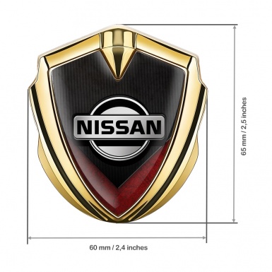 Nissan Domed Emblem Gold Ribbed Base Red V Shaped Element