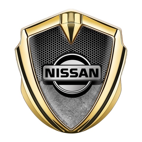Nissan Emblem Ornament Gold Grey Honeycomb Scratched Surface