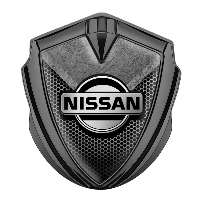 Nissan Bodyside Domed Emblem Graphite Hexagon Texture Stone Fragment