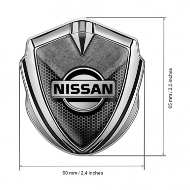Nissan Bodyside Domed Emblem Silver Hexagon Texture Stone Fragment