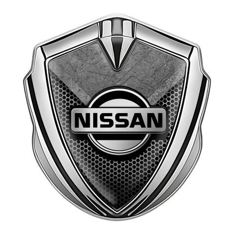Nissan Bodyside Domed Emblem Silver Hexagon Texture Stone Fragment