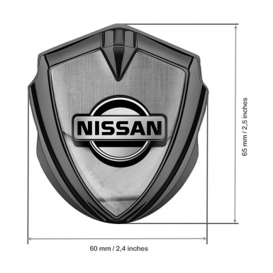 Nissan Emblem Car Badge Graphite Stone Slab Tarmac Texture Design