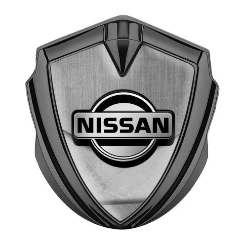 Nissan Emblem Car Badge Graphite Stone Slab Tarmac Texture Design