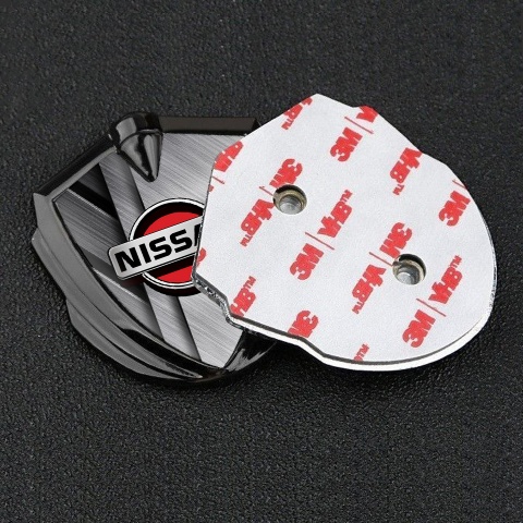 Nissan Domed Badge Graphite Brushed Aluminum Effect Red Logo Design