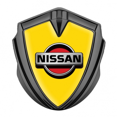 Nissan Badge Self Adhesive Graphite Yellow Background Front Grey Logo