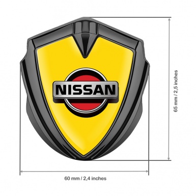 Nissan Badge Self Adhesive Graphite Yellow Background Front Grey Logo