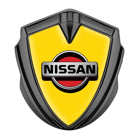 Nissan Badge Self Adhesive Graphite Yellow Background Front Grey Logo