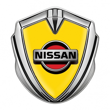 Nissan Badge Self Adhesive Silver Yellow Background Front Grey Logo