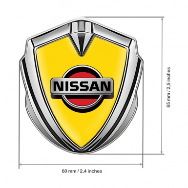 Nissan Badge Self Adhesive Silver Yellow Background Front Grey Logo