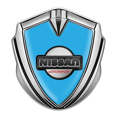 Nissan Emblem Self Adhesive Silver Sky Blue Base Heavy Dark Logo