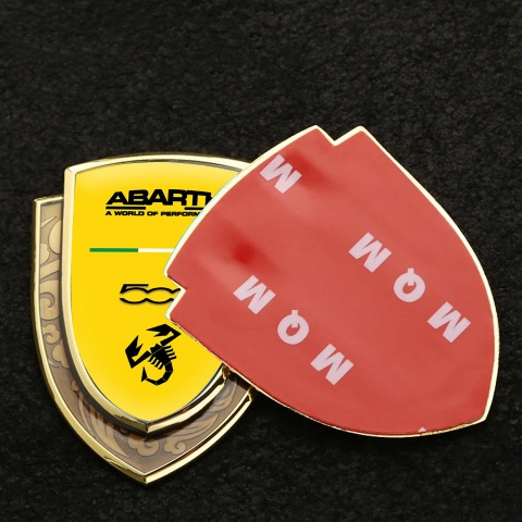 Fiat Abarth Emblem Ornament Gold Yellow Background Type 500 Design