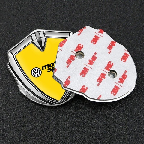 VW Domed Emblem Silver Yellow Background Motorsport Logo Design