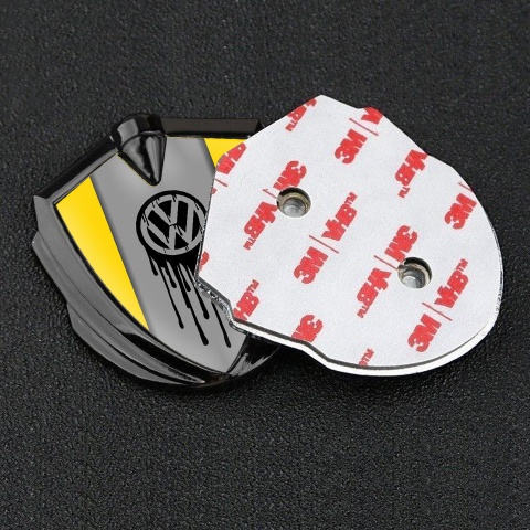 VW Metal Emblem Badge Graphite Yellow Base Dripping Brush Effect