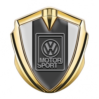 VW Domed Emblem Gold Light Background Grey Motorsport Logo