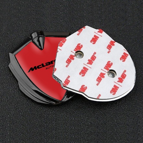 Mclaren Metal Domed Emblem Graphite Crimson Background Classic Logo