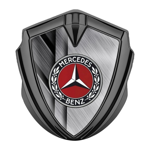 Mercedes Benz Abzeichen selbstklebend Graphit Tonfarbe mit Kreuzplatten Hintergrund und Rotes Kreis Logo