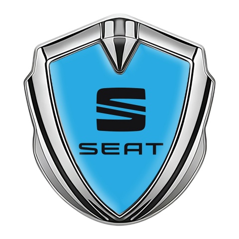 Seat Emblem Abzeichen Silbertonfarbe Himmelblau Basis mit Schwarz Logo