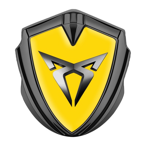 Seat Cupra Emblem Abzeichen selbstklebend Graphit Tonfarbe Gelb Basis mit Metall Logo Stil