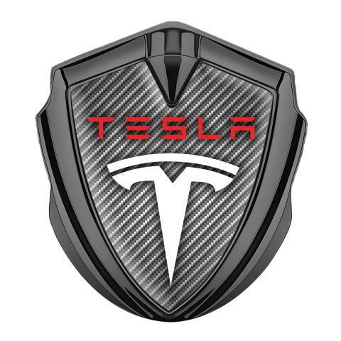 Tesla Abzeichen selbstklebend Graphit Tonfarbe Grau Carbon mit Weiss Rote Logo