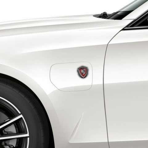 Porsche Abzeichen selbstklebend Graphit Tonfarbe mit Rot Carbon Hintergrund und Farbe Logo