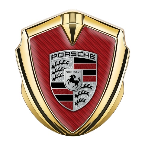 Porsche Abzeichen selbstklebend Goldtonfarbe mit Rot Carbon Hintergrund und Farbe Logo