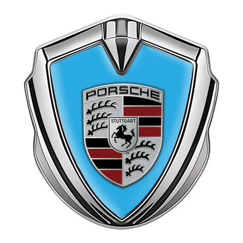 Porsche Emblem Auto Zeichen Silbertonfarbe mit Blau Hintergrund Auflage