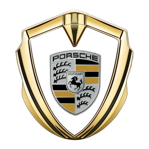 Porsche Abzeichen selbstklebend Goldtonfarbe mit Weiss Hintergrund und Gelb Elemente Logo