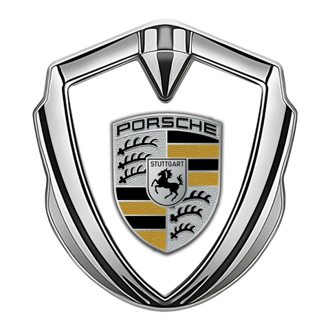 Porsche Abzeichen selbstklebend Silbertonfarbe mit Weiss Hintergrund und Gelb Elemente Logo