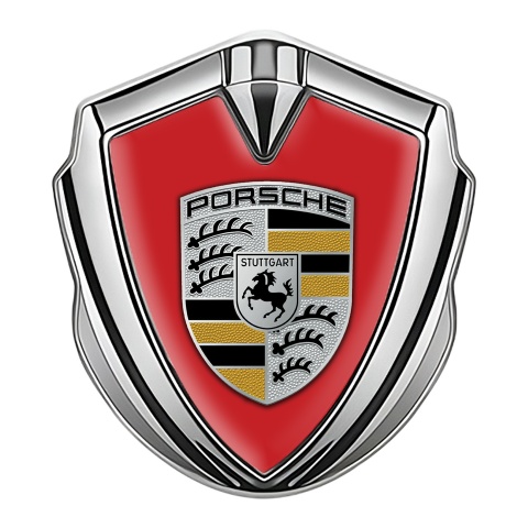 Porsche Emblem Abzeichen selbstklebend Silbertonfarbe mit Rote Hintergrund und Schwarz Gelb Logo Stil