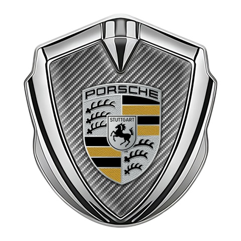 Porsche Selbstklebendes Metallaufkleber Emblem Silbertonfarbe mit Heller Kohlenstoff Hintergrund Design