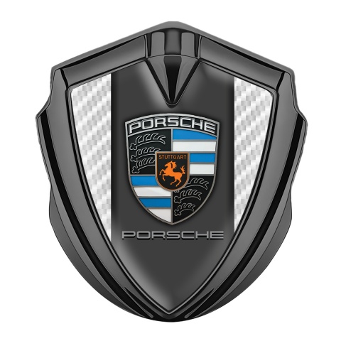 Porsche Emblem Logo Schriftzug Aufkleber Graphit Tonfarbe weiss Kohlenstoff Hintergrund und Grau Panel