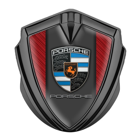 Porsche Seitenflugel Emblem Aufkleber Graphit Tonfarbe mit Rot carbon Hintergrund und Grau Panel Logo